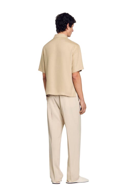 Sandro Zip-neck Polo Shirt In Sand.