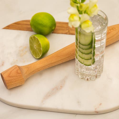 A Bar Above Wooden Cocktail Muddler In Natural