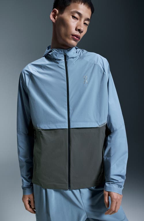On Core Hooded Packable Running Jacket In Chambray/eclipse