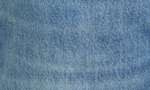 Victoria Beckham Twisted Slouch Jeans In Vintage Indigo