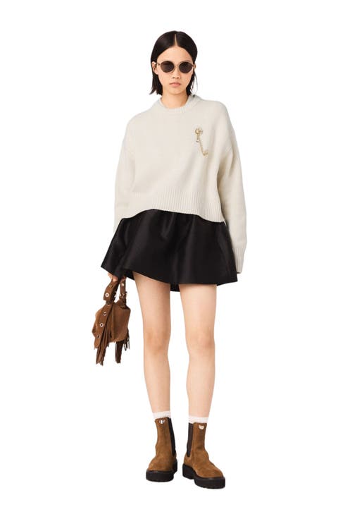 Sweater With Floral Brooch
