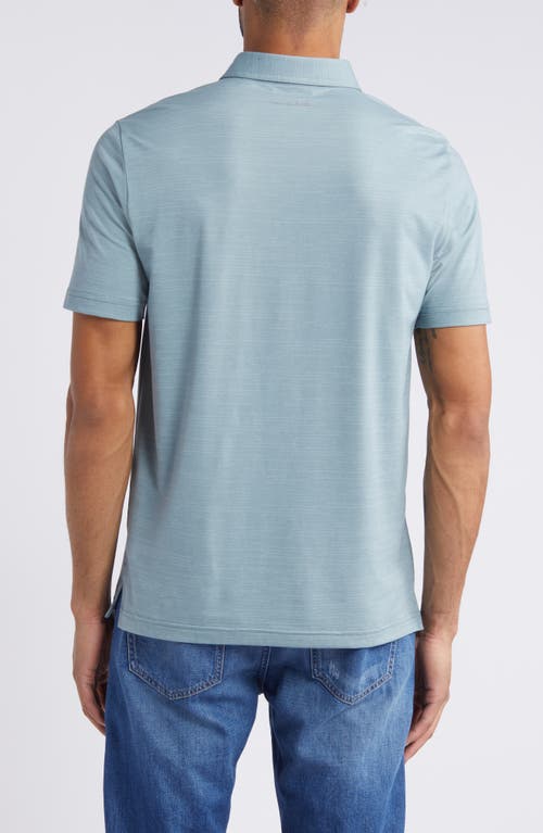 Travismathew The Heater Solid Short Sleeve Performance Polo In Arona