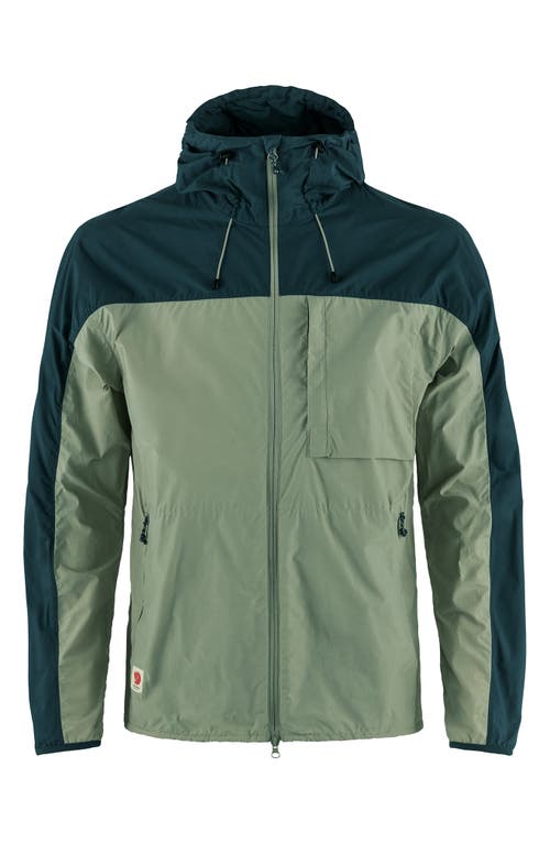 Fjällräven High Coast Hooded Wind Jacket in Patina Green-Navy 
