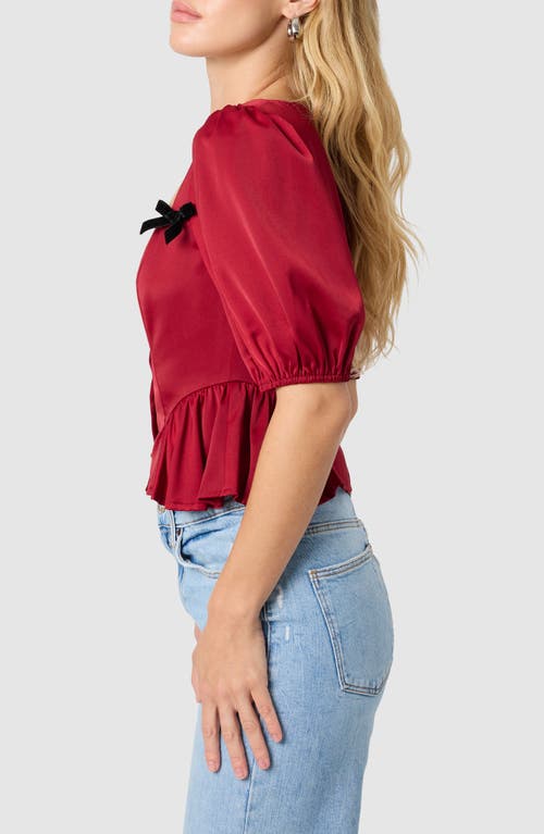 Lush Bow Appliqué Peplum Top In Burgundy