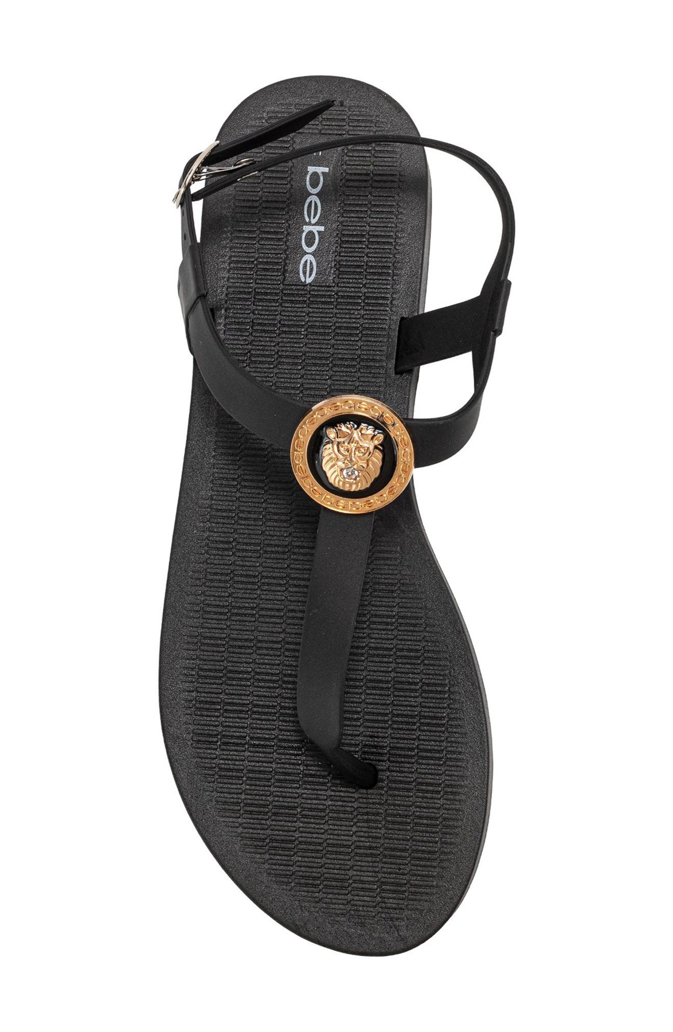 bebe Lion Charm T-Strap Sandal, Alternate, color, Black