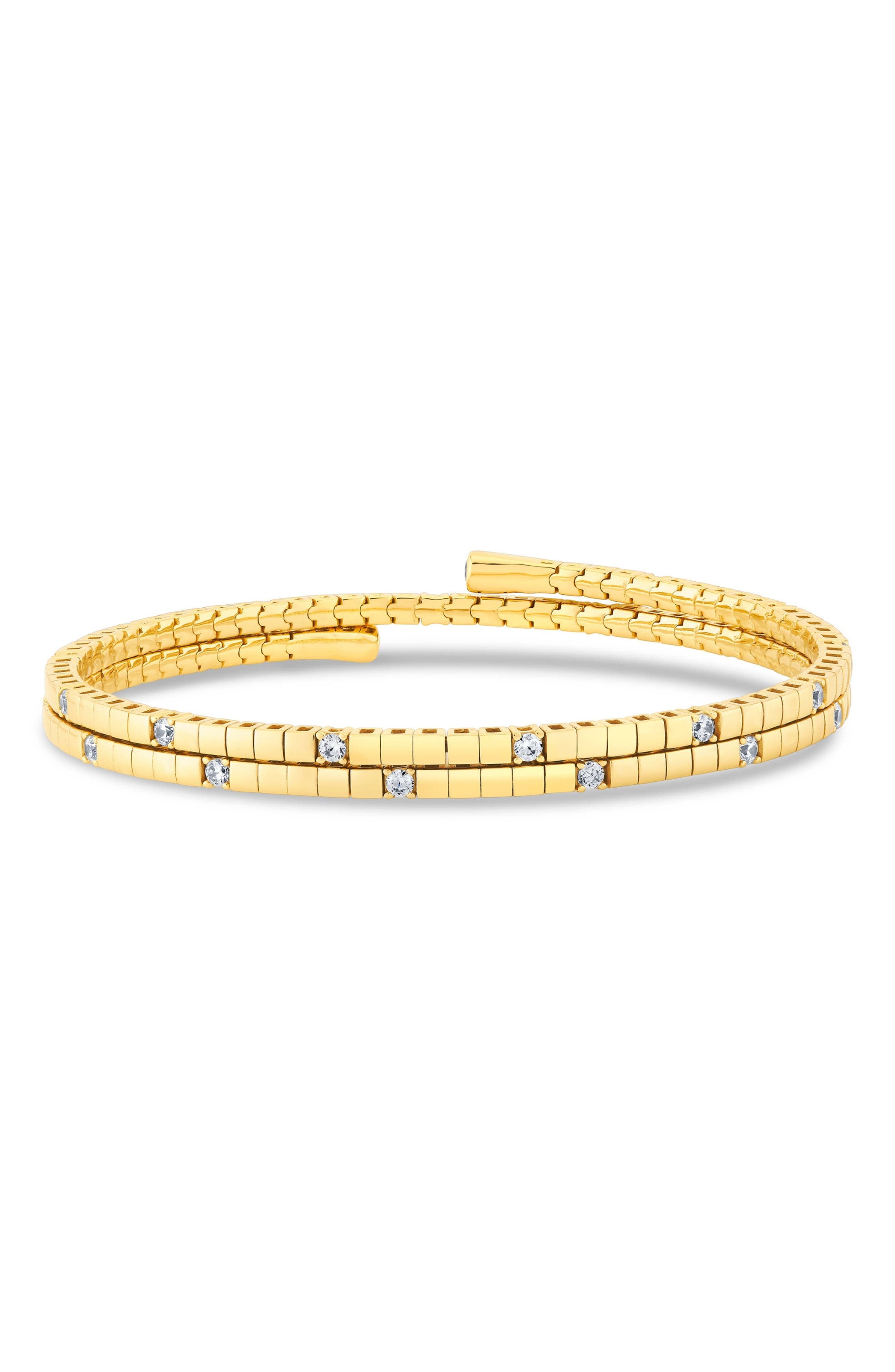 18KT YELLOW GOLD / CLEAR STONE