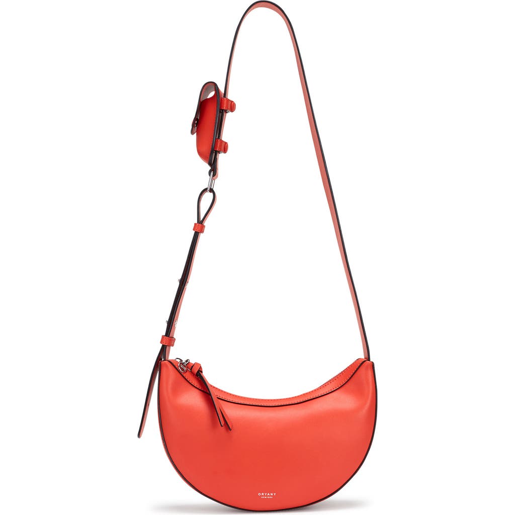 Oryany Rookie Crescent Leather Crossbody Bag In Orange