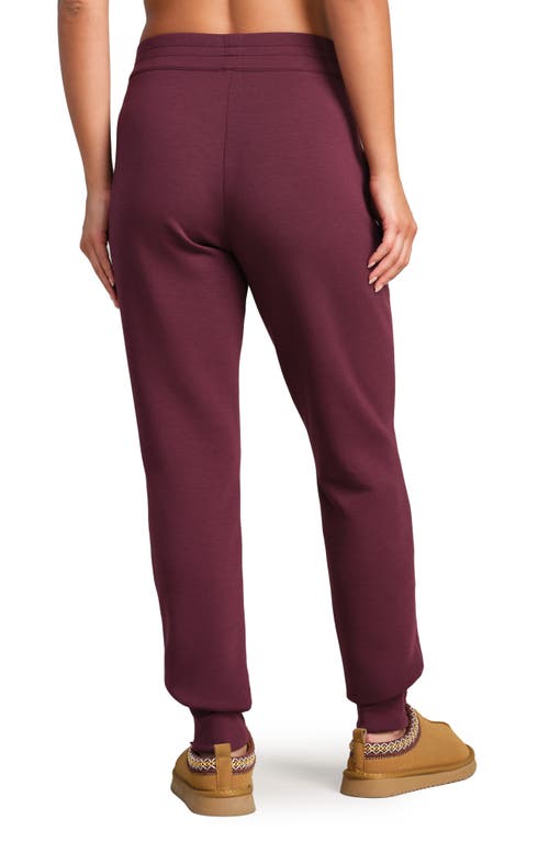 Rhone Dreamglow Tapered Pants In Burgundy