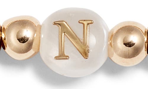 Nashelle Mother Of Pearl Initial Beaded Bracelet In Gold Fill N