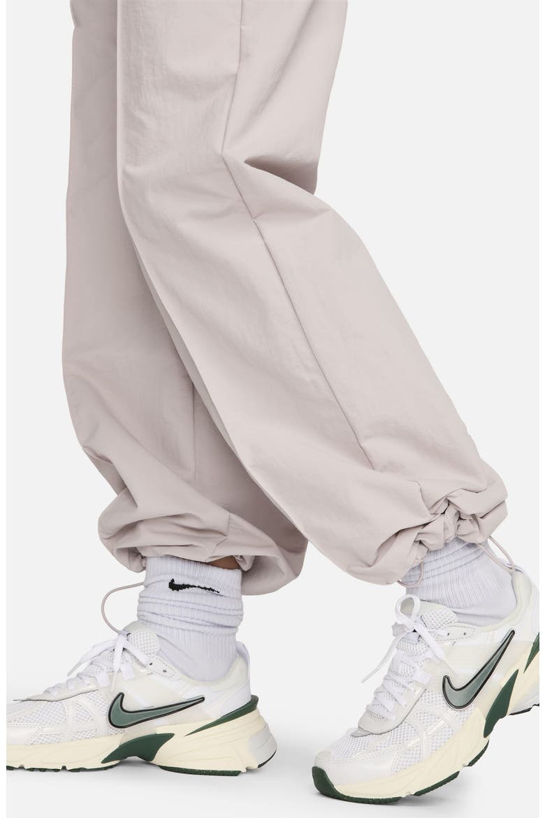 Sportswear Everything Wovens Mid-Rise Open-Hem Pants, Alternate, color, PLATINUM VIOLET/ SAIL