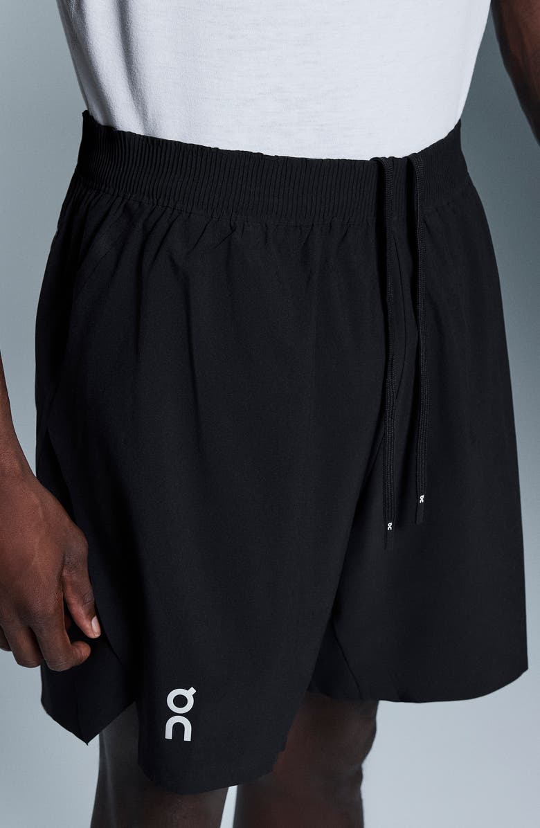 On Core 7-Inch Running Shorts, Alternate, color, Black