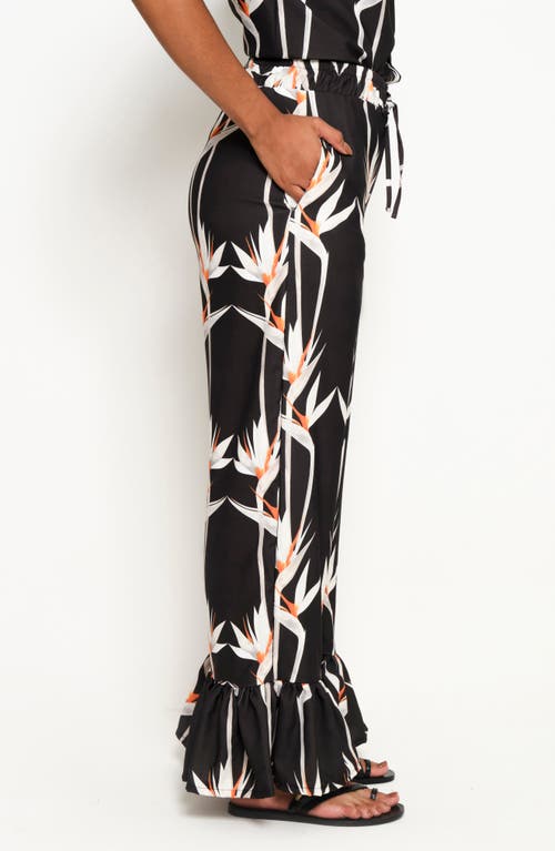 The Lulo Project Floral Ruffle Hem Drawstring Pants In Birds Of Paradise Black