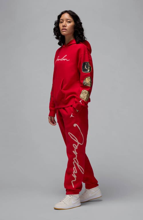 Shop Jordan Brooklyn Fleece Rhinestone Logo Sweatpants In Gym Red/white