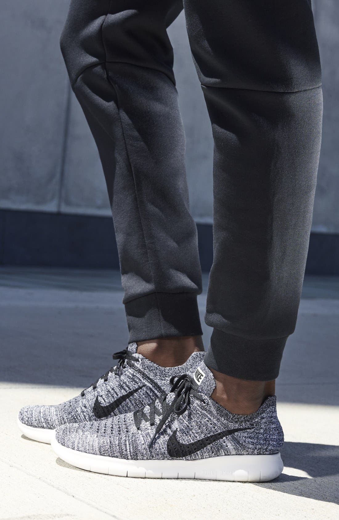 Nike 'Free Run Flyknit' Running Shoe, Alternate, color, 