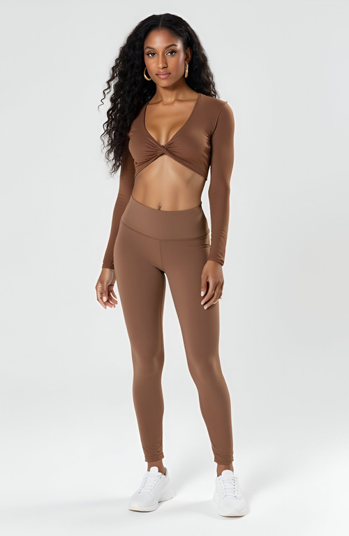 Modenaire Active Long Sleeve Twist Front Crop Top In Brown