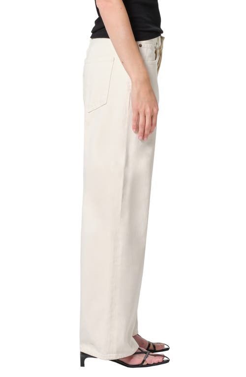 Shop Agolde Low Slung Baggy Jeans In Solar