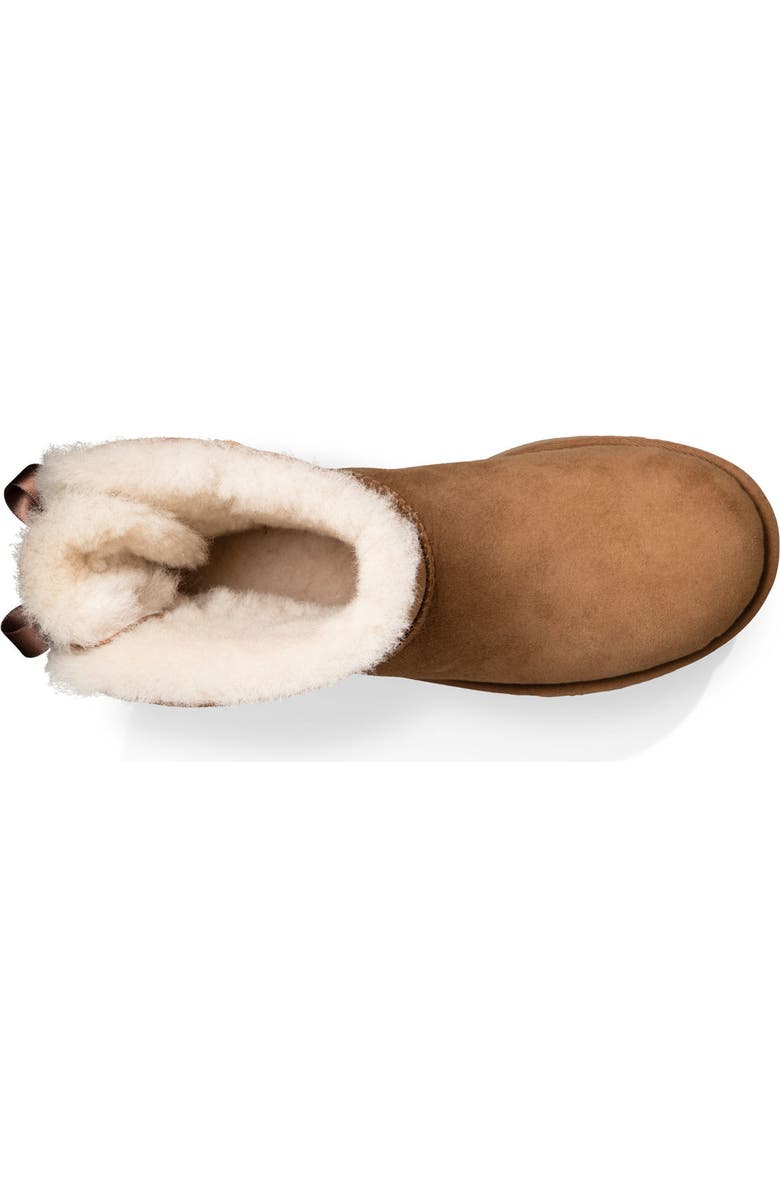 UGG<sup>®</sup> Mini Bailey Bow II Genuine Shearling Bootie, Alternate, color, Chestnut Suede