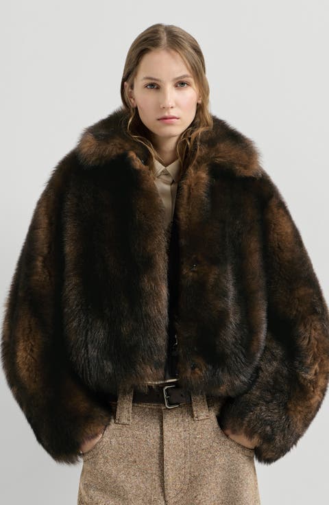Soft shearling outerwear jacket with shiny zipper pull
