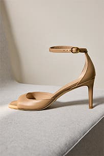 A heeled sandal. 