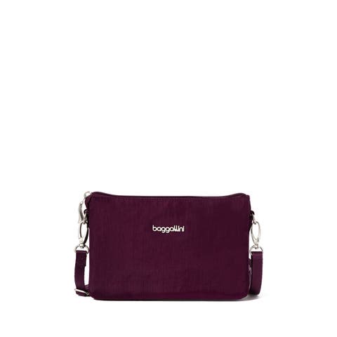 Crossbody top Bag matches this plum/dark purple coat.