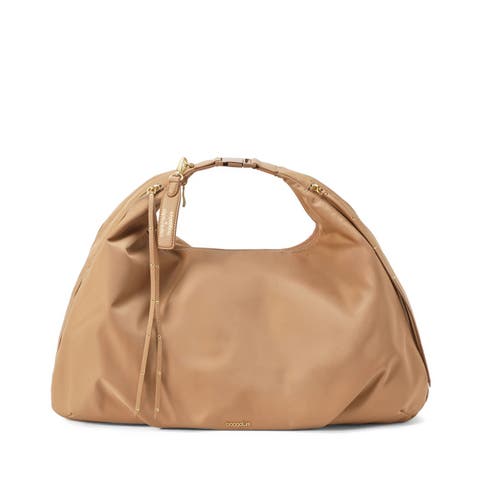 Coco Rocha X Baggallini Super Bagg