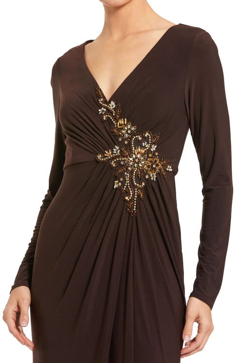 Mac Duggal Faux Wrap Long Sleeve Evening Gown With Appliqué Detail In Brown