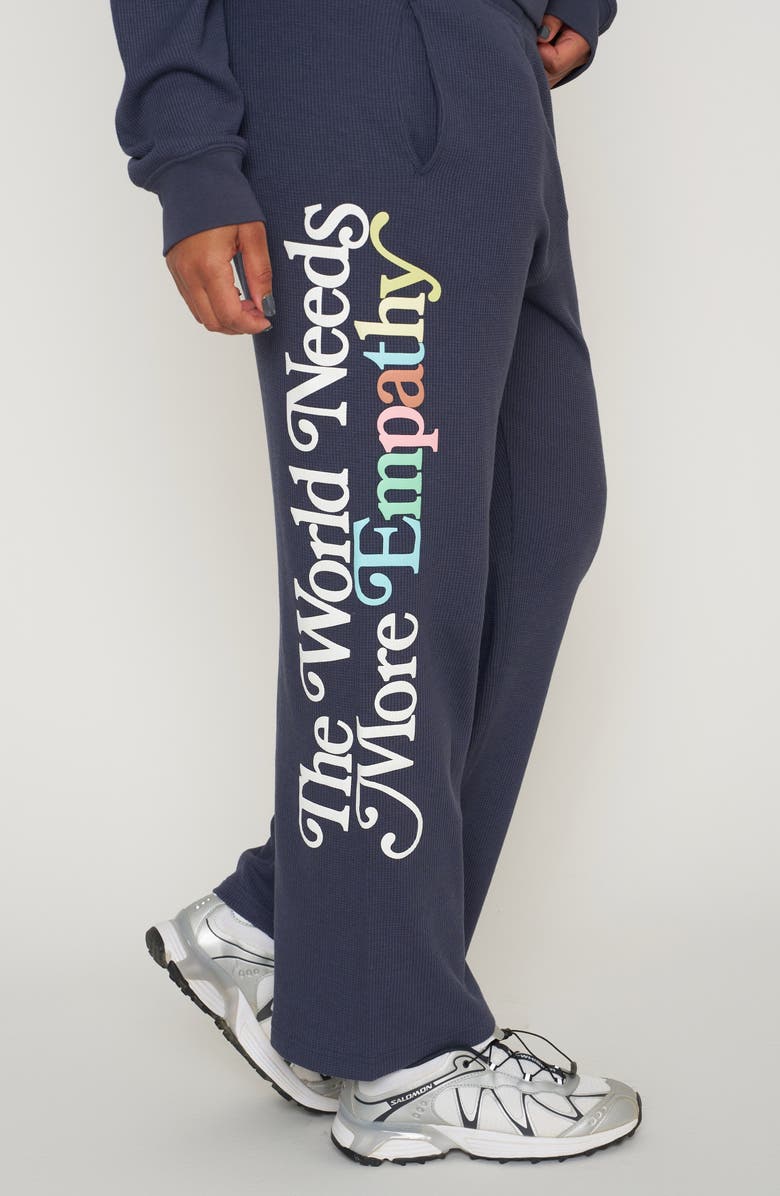 THE MAYFAIR GROUP World Needs Empathy Waffle Knit Fleece Graphic Sweatshirt, Alternate, color, Navy Blue