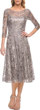 La Femme Lace Metallic Tea Length Dress with Three-Quarter Sleeves
