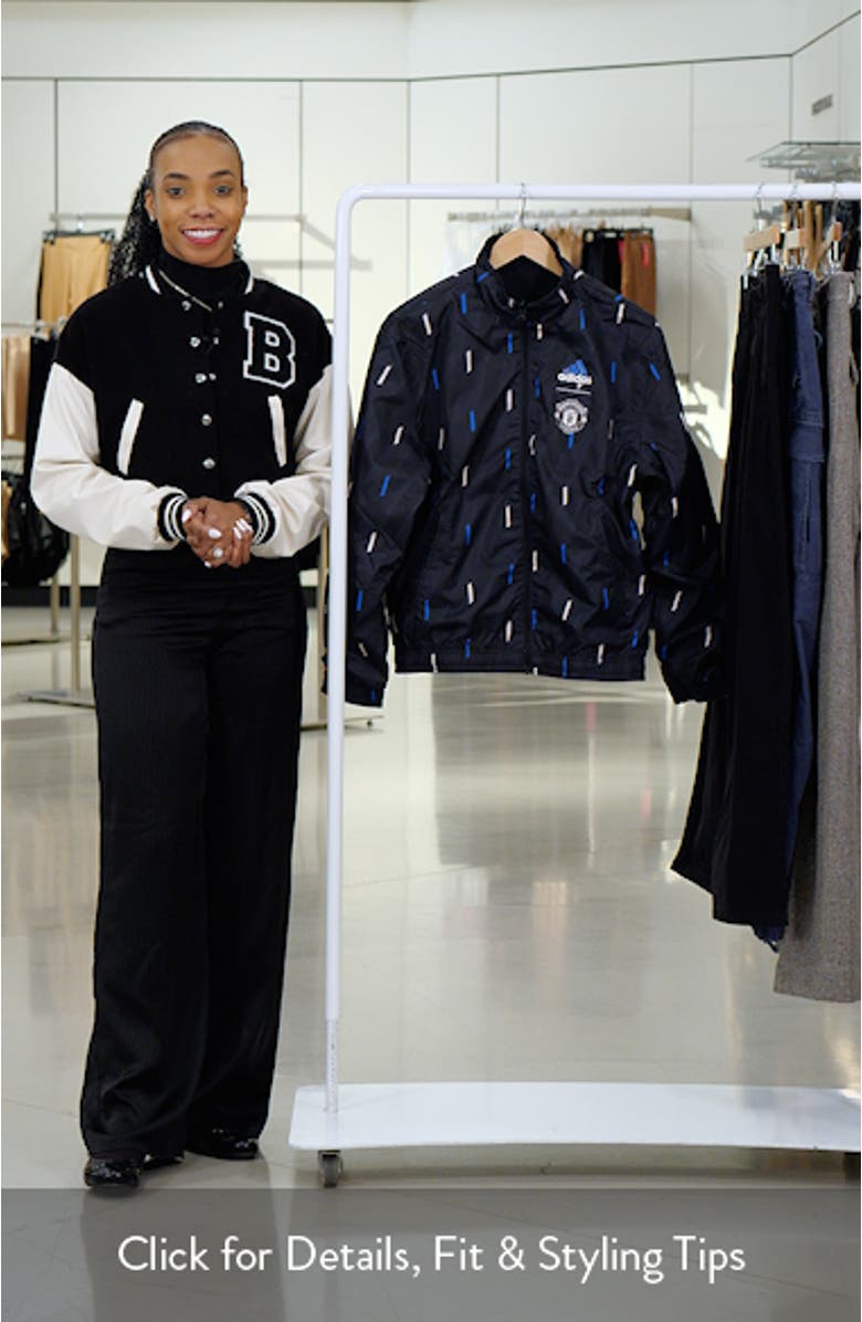 Men's adidas Black Manchester United 2022/23 On-Field Team Logo Anthem Reversible Full-Zip Jacket, sales video thumbnail