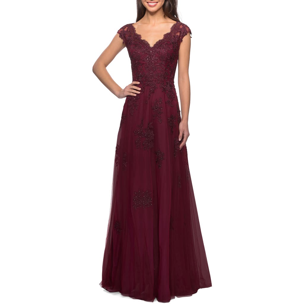 LA FEMME LA FEMME SHORT SLEEVE LACE GOWN WITH CASCADING EMBELLISHMENTS