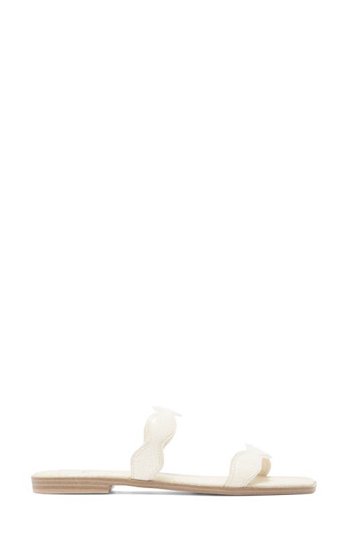 Dolce Vita Ilva Low Slide Sandal In Creme Embossed