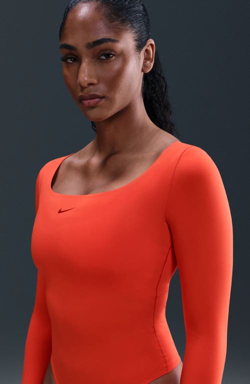 Nike Dri-fit Long Sleeve Bodysuit In Gold