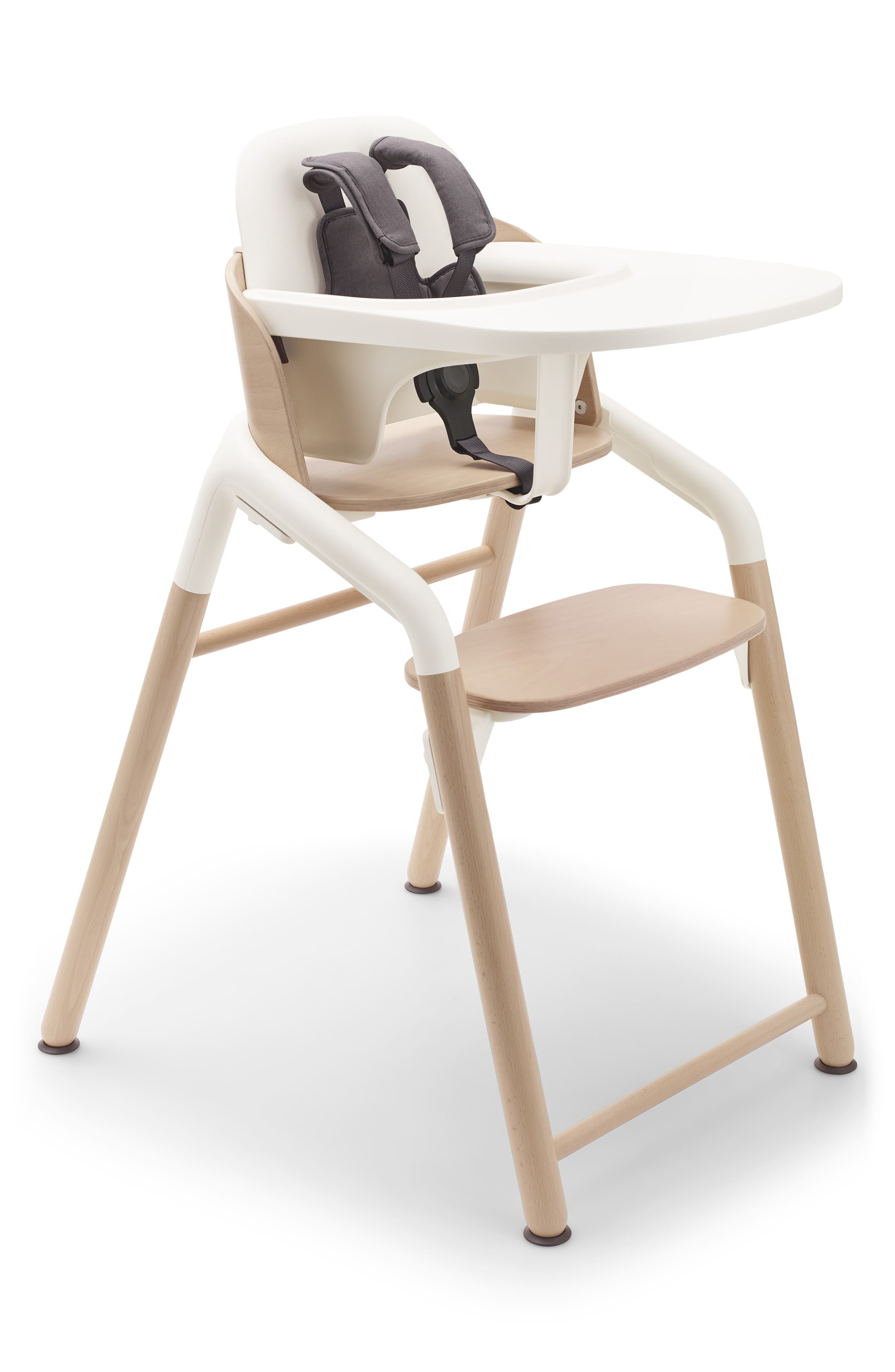 White and beige high chair with tray and black straps