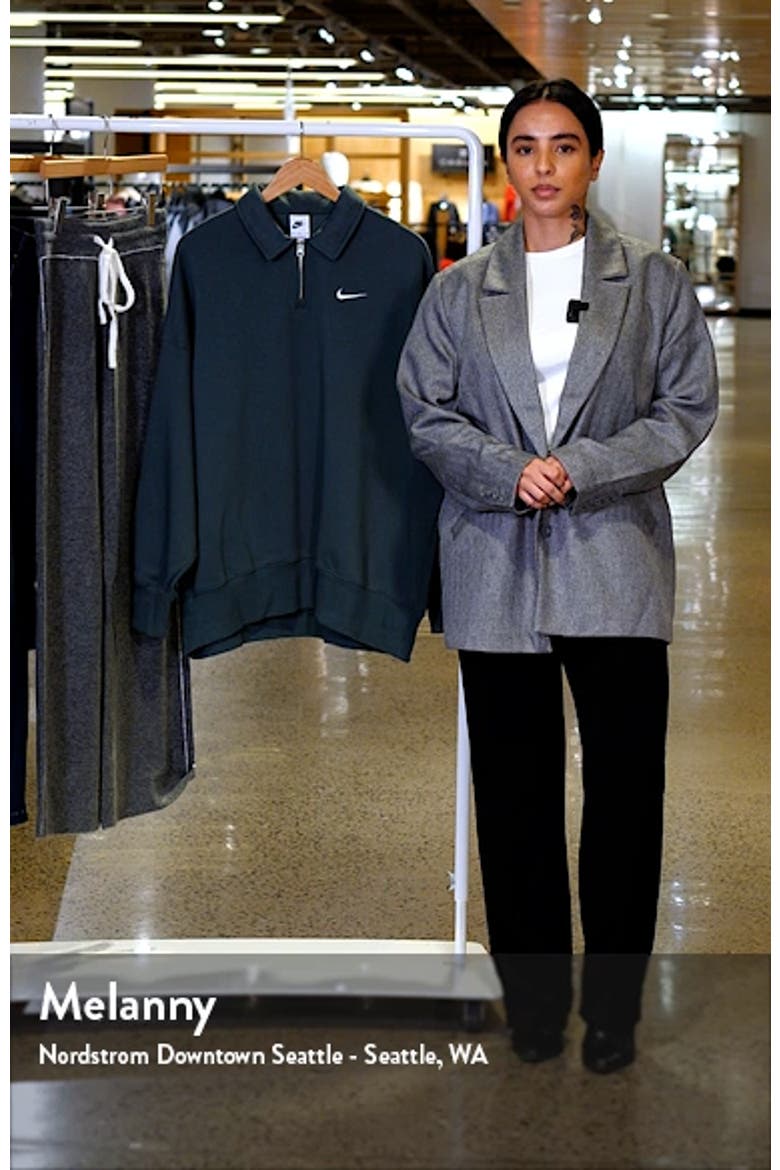 Sportswear Phoenix Fleece Quarter Zip Oversize Polo Sweatshirt video