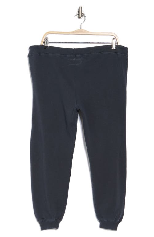The Great . The Cropped Jogger Pants In Washed Navy