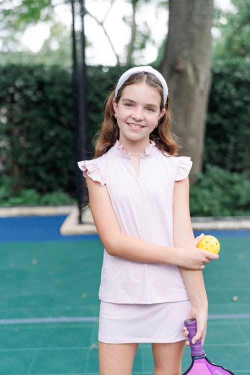 LILA AND HAYES LILA AND HAYES ELLIE GIRLS' SLEEVELESS RUFFLED TOP BY LH SPORT 