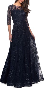 La Femme A-line Lace Sequin Gown with Sheer Scoop Neckline