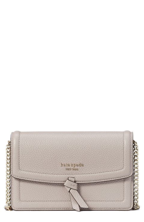 knott pebbled leather flap crossbody bag