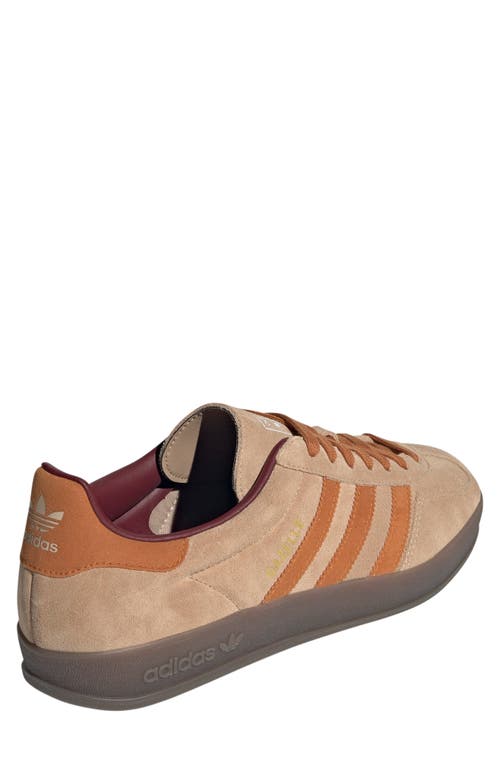 Shop Adidas Originals Adidas Gazelle Indoor Sneaker In Sandstone/ochre/shadow Red