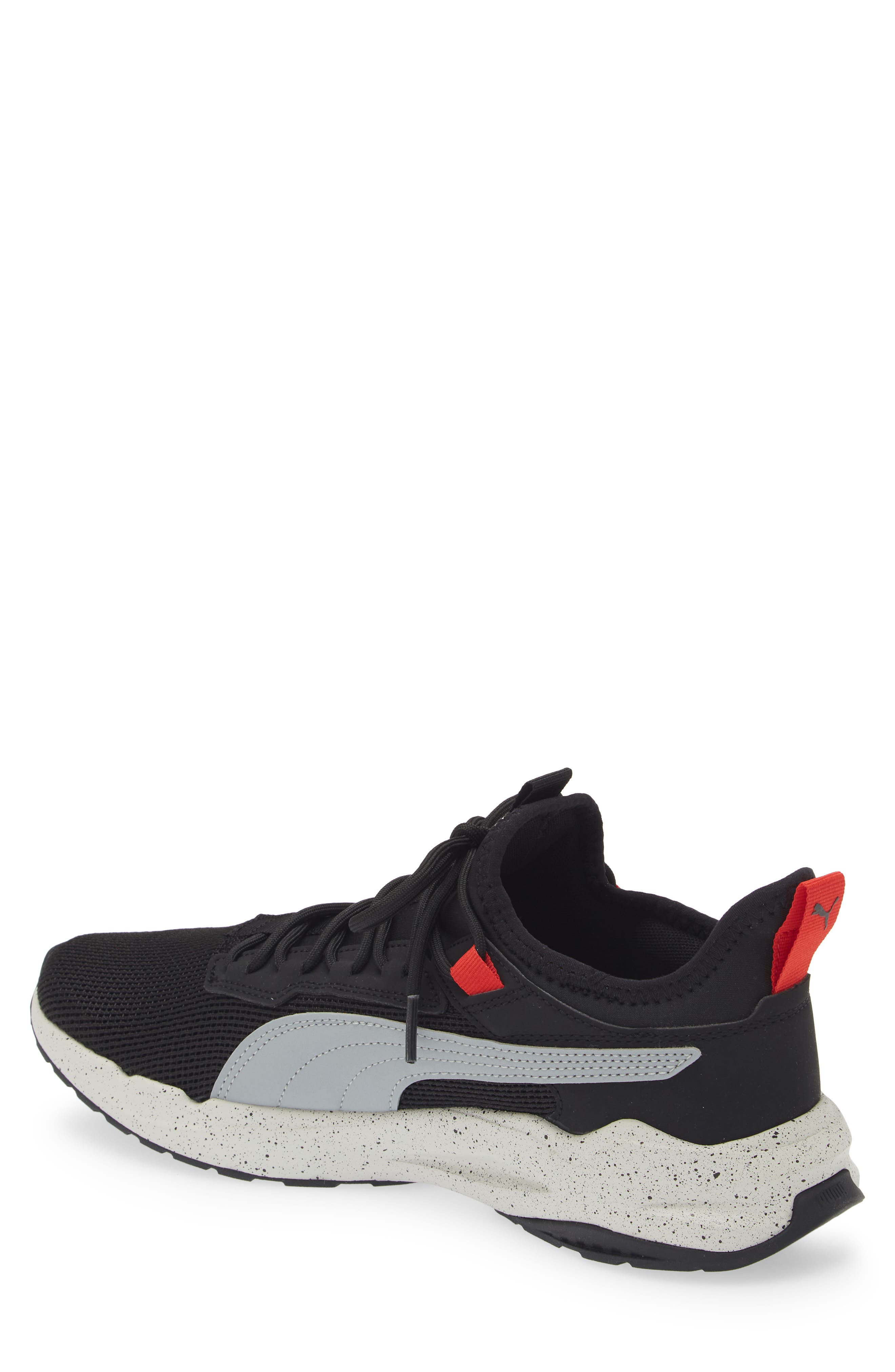 PUMA Stride Exero Speckle Sneaker, Alternate, color, Black