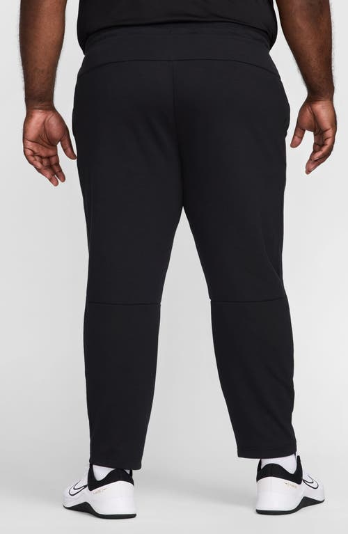 Nike Primary Fleece Dri-fit Uv Tapered Performance Pants In Black