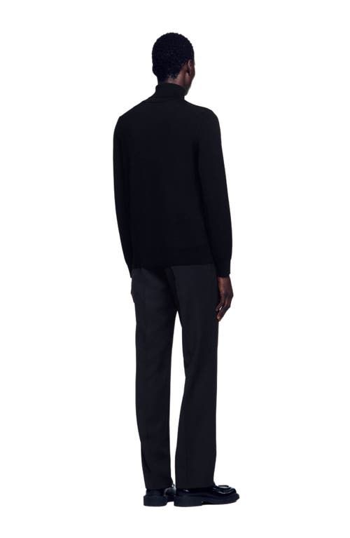 Sandro Roll Neck Wool Sweater In Black
