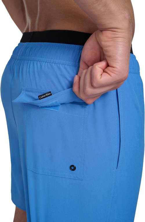 Shop Calvin Klein Swim Trunks In Blue