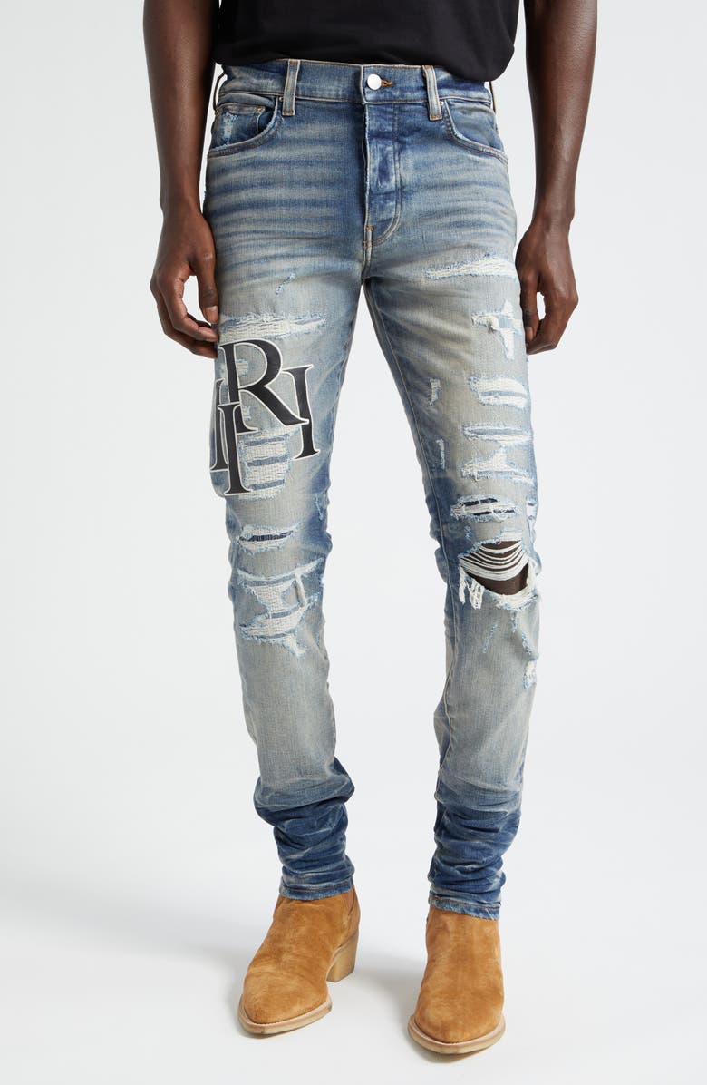 AMIRI Staggered Logo Distressed Skinny Jeans, Main, color,