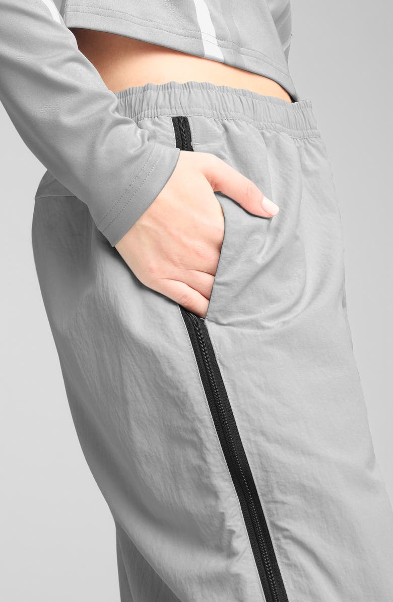 PUMA Dare To Relaxed Woven Zip-Off Pants, Alternate, color,