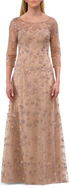 La Femme Floral Long Gown with Illusion Neckline and Three Quarter Sleeves
