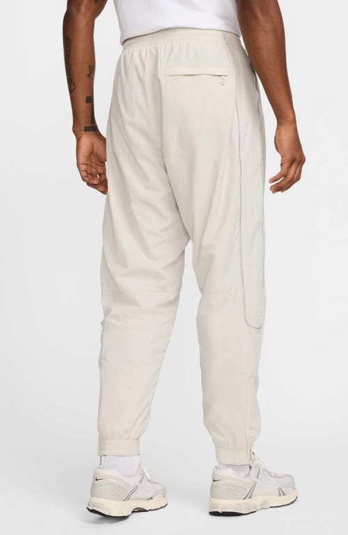 Nike Men's Solo Swoosh Track Pants In Light Bone/white