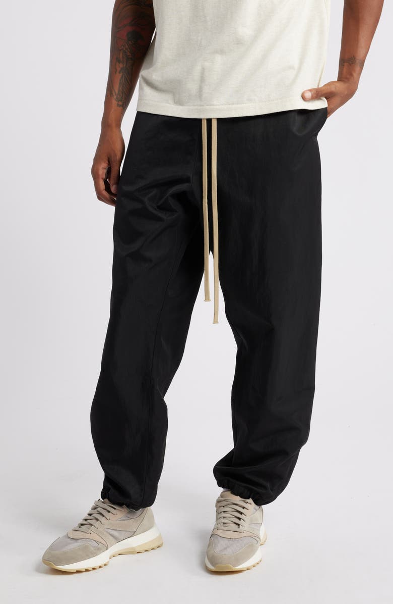 Fear of God Essentials Gender Inclusive Textured Nylon Track Pants, Main, color,