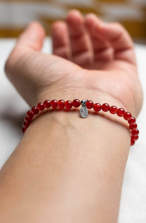 Tiny Rituals Carnelian Energy Bracelet In Red/orange