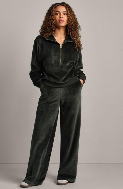 Rhone Plush Half Zip Pullover In Green